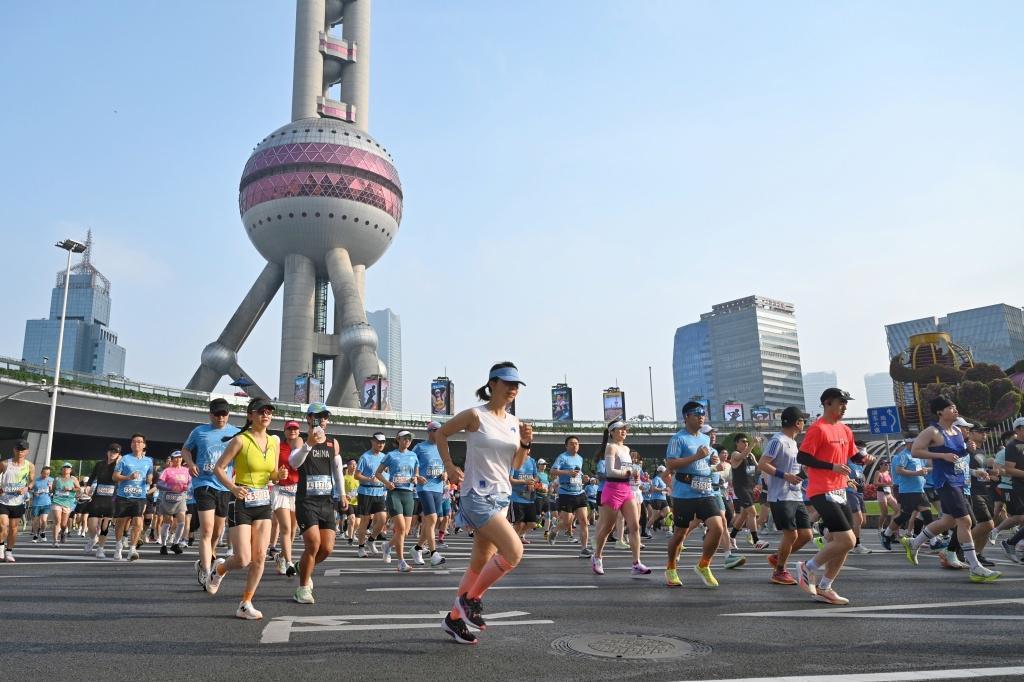 开云登录入口地址-十年能打磨出一场怎样的大众赛事？上海半马即将鸣枪给出答案